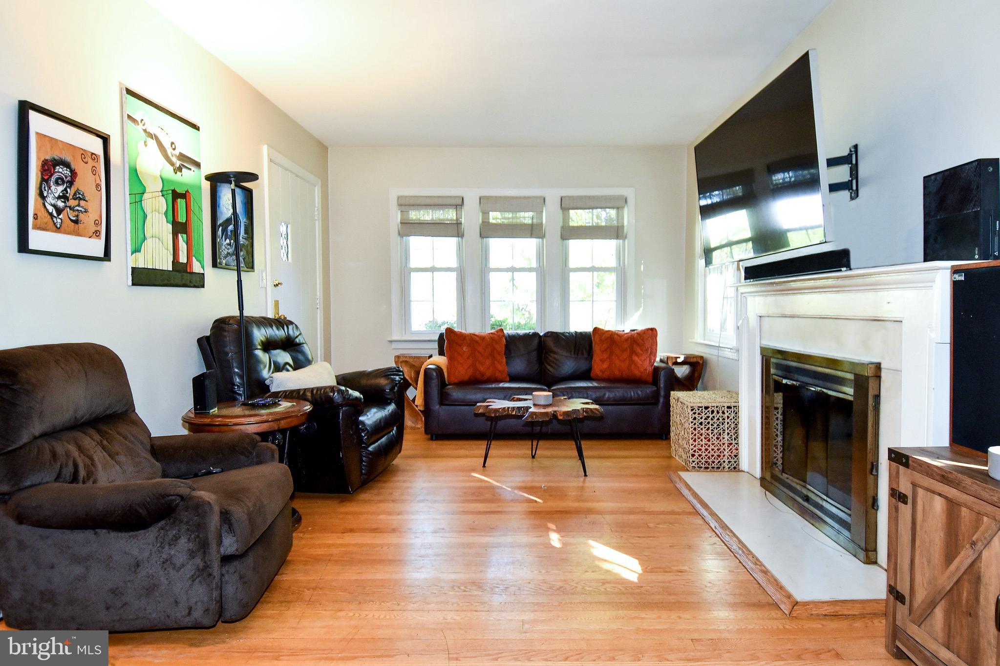 2116 Seminary Road Silver Spring, MD 20910 - Photo 3 of 33 Bright open living room with rich hardwood floors.