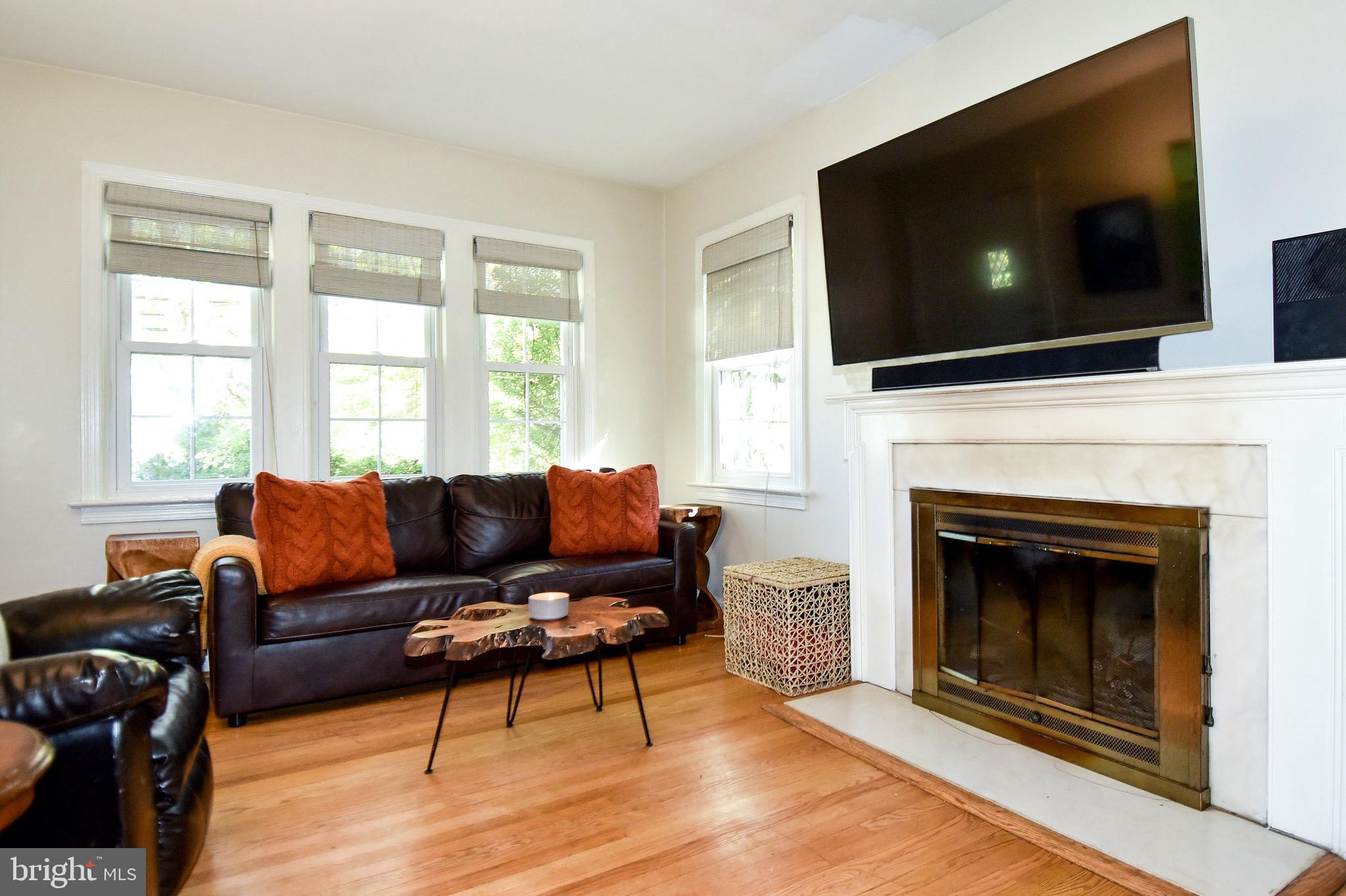 2116 Seminary Road Silver Spring, MD 20910 - Photo 4 of 33 Enjoy movie nights in front of the fireplace.