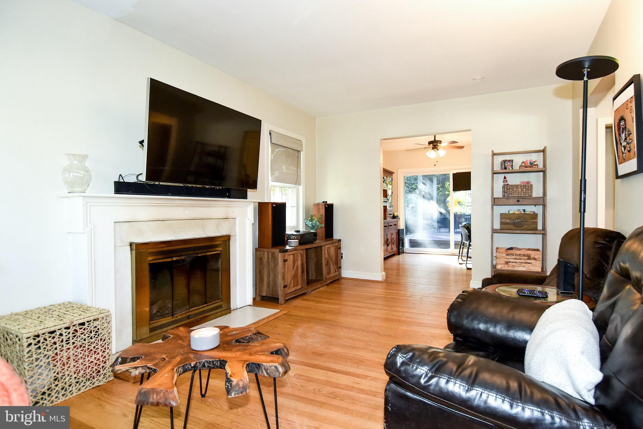 2116 Seminary Road Silver Spring, MD 20910 - Photo 5 of 33 Wall mounted TV conveys with the home.