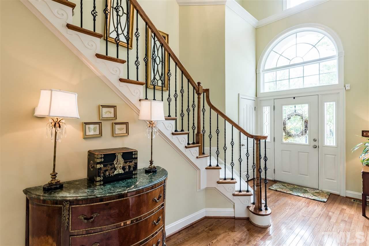 2247 Clayette Court Raleigh, NC 27612 - Photo 3 of 25 a view of entryway livingroom and hall with wooden floor