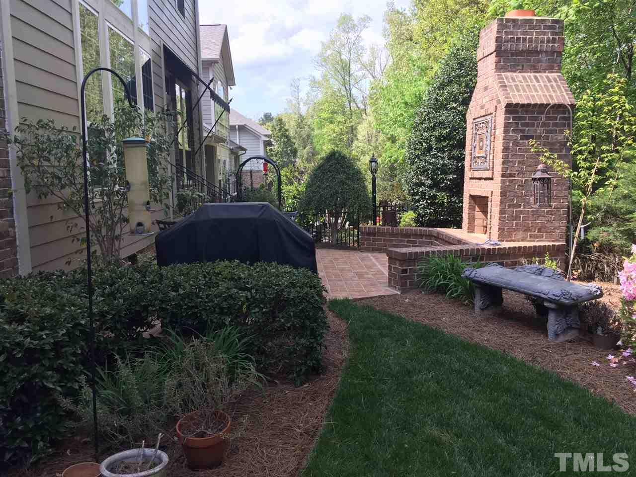 2247 Clayette Court Raleigh, NC 27612 - Photo 24 of 25 a view of a backyard with sitting area