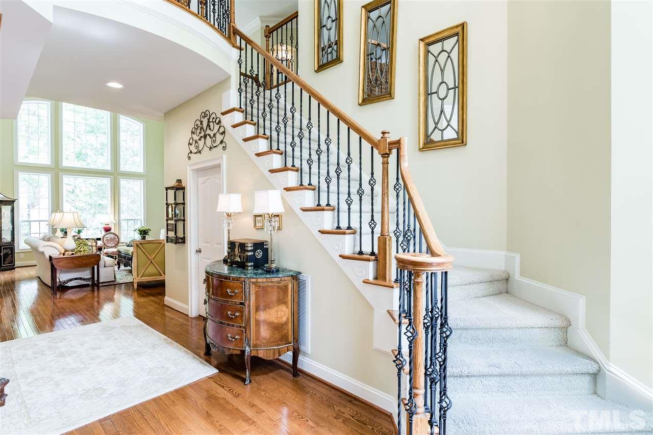 2247 Clayette Court Raleigh, NC 27612 - Photo 4 of 25 a view of entryway and hall with wooden floor