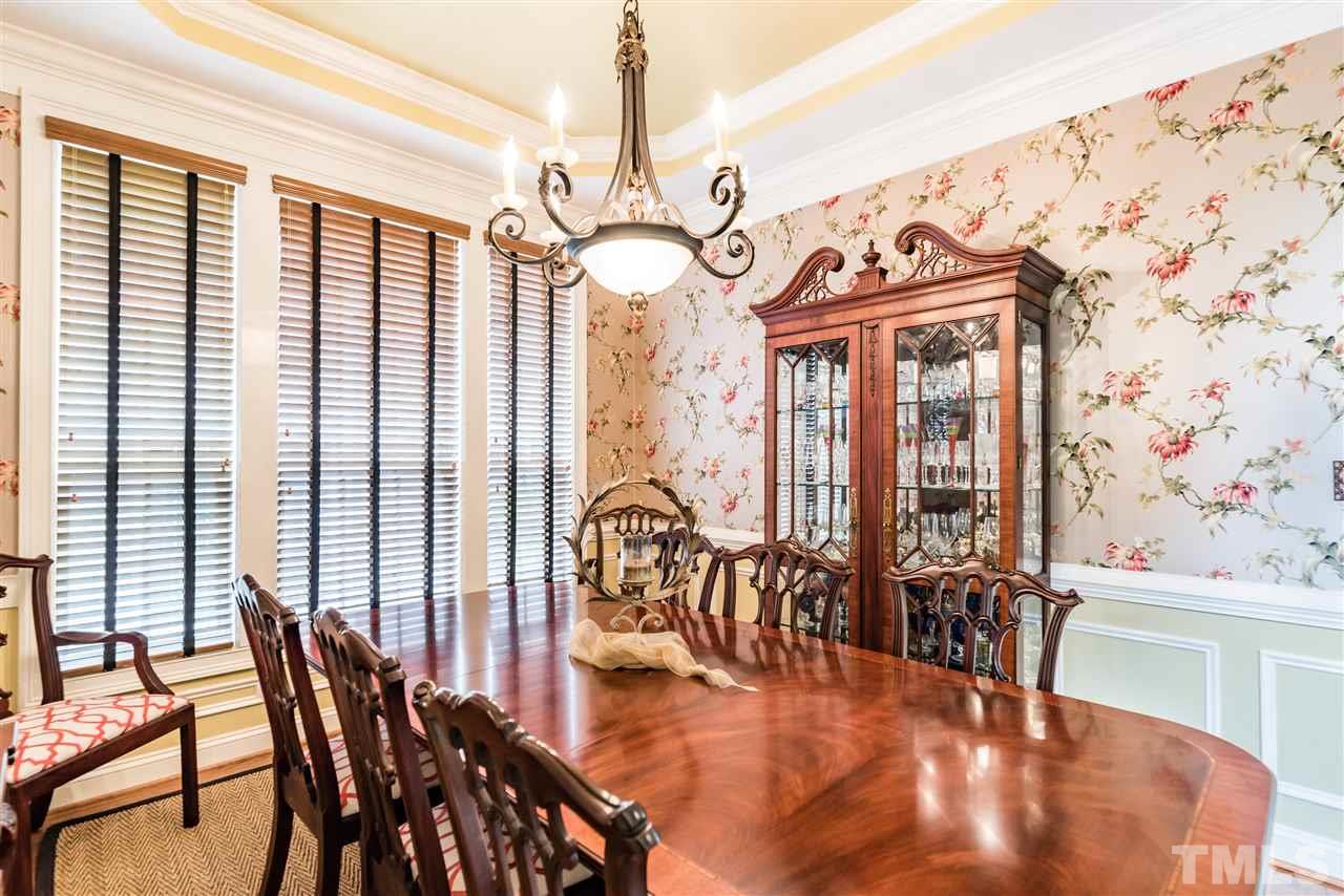2247 Clayette Court Raleigh, NC 27612 - Photo 6 of 25 a view of a dining room with furniture window and outside view