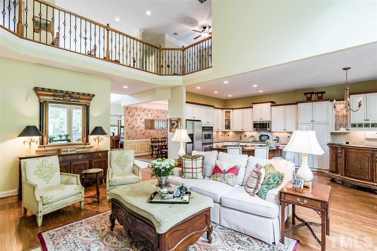 2247 Clayette Court Raleigh, NC 27612 - Photo 9 of 25 a living room with lots of furniture and kitchen view