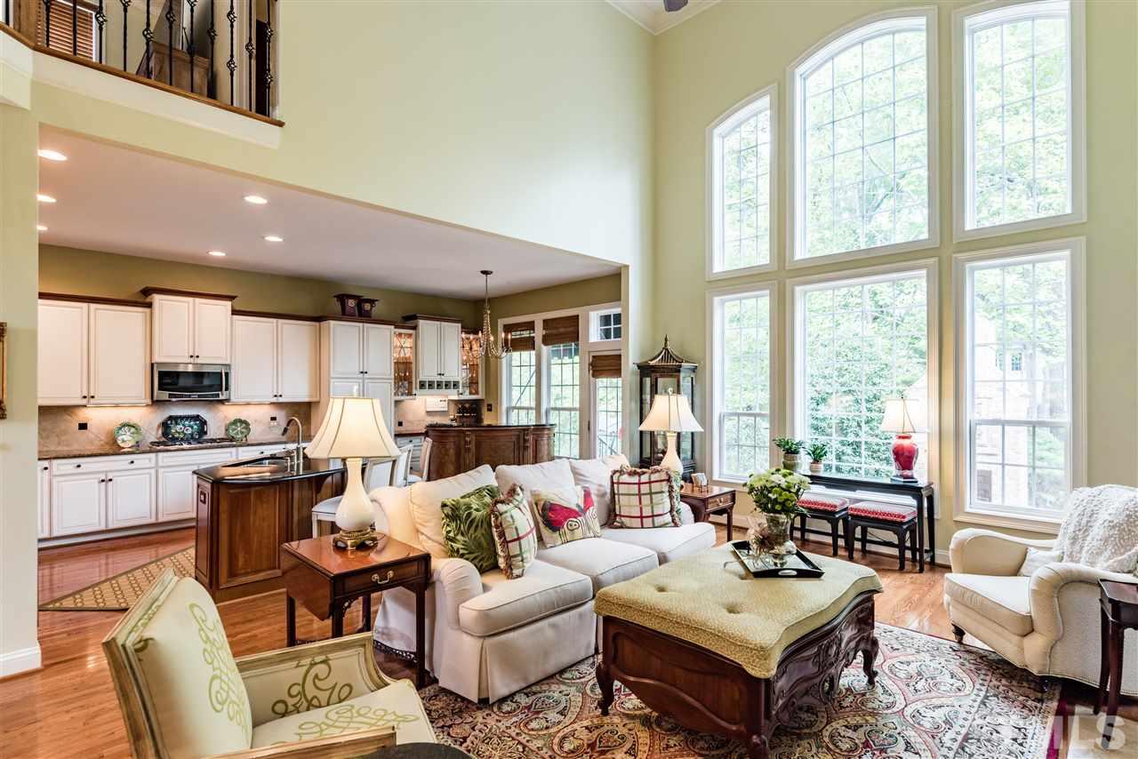 2247 Clayette Court Raleigh, NC 27612 - Photo 10 of 25 a living room with lots of furniture and a large window