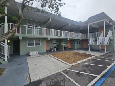 2035 Alpine Road, Unit 6 Clearwater, FL 33755 - Photo 2 of 17 a view of a house with balcony