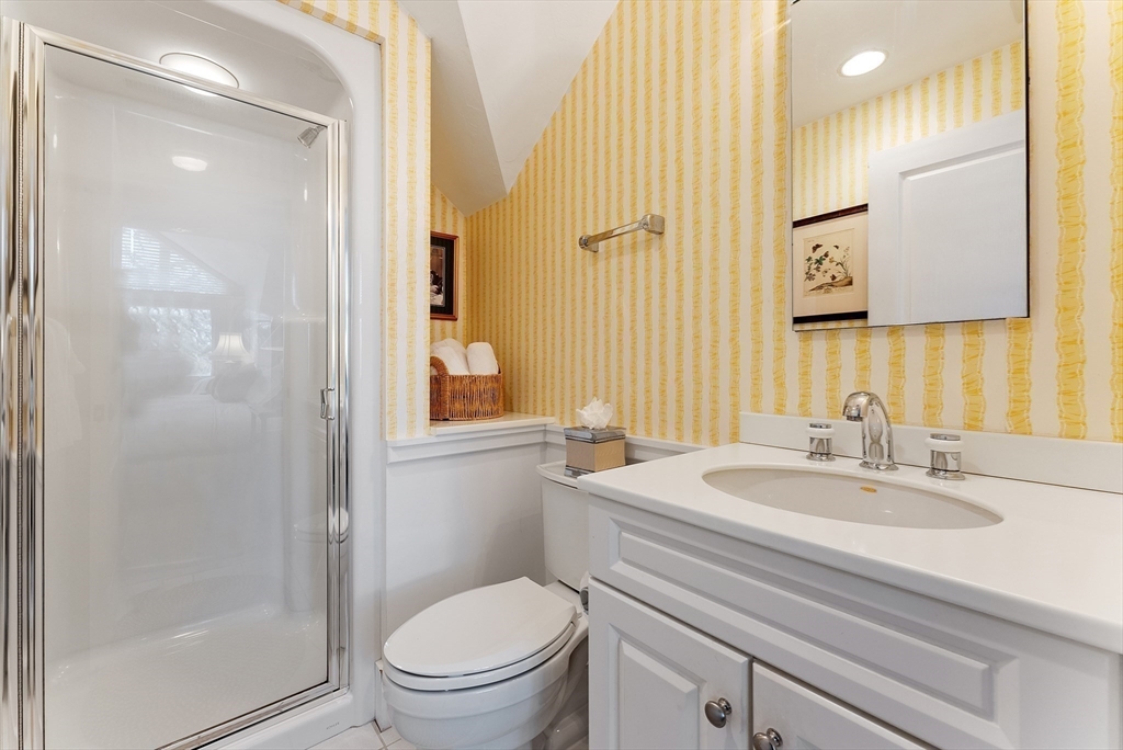 203 Willowbend Drive Mashpee, MA 02649 - Photo 24 of 41 a bathroom with a sink a toilet and shower