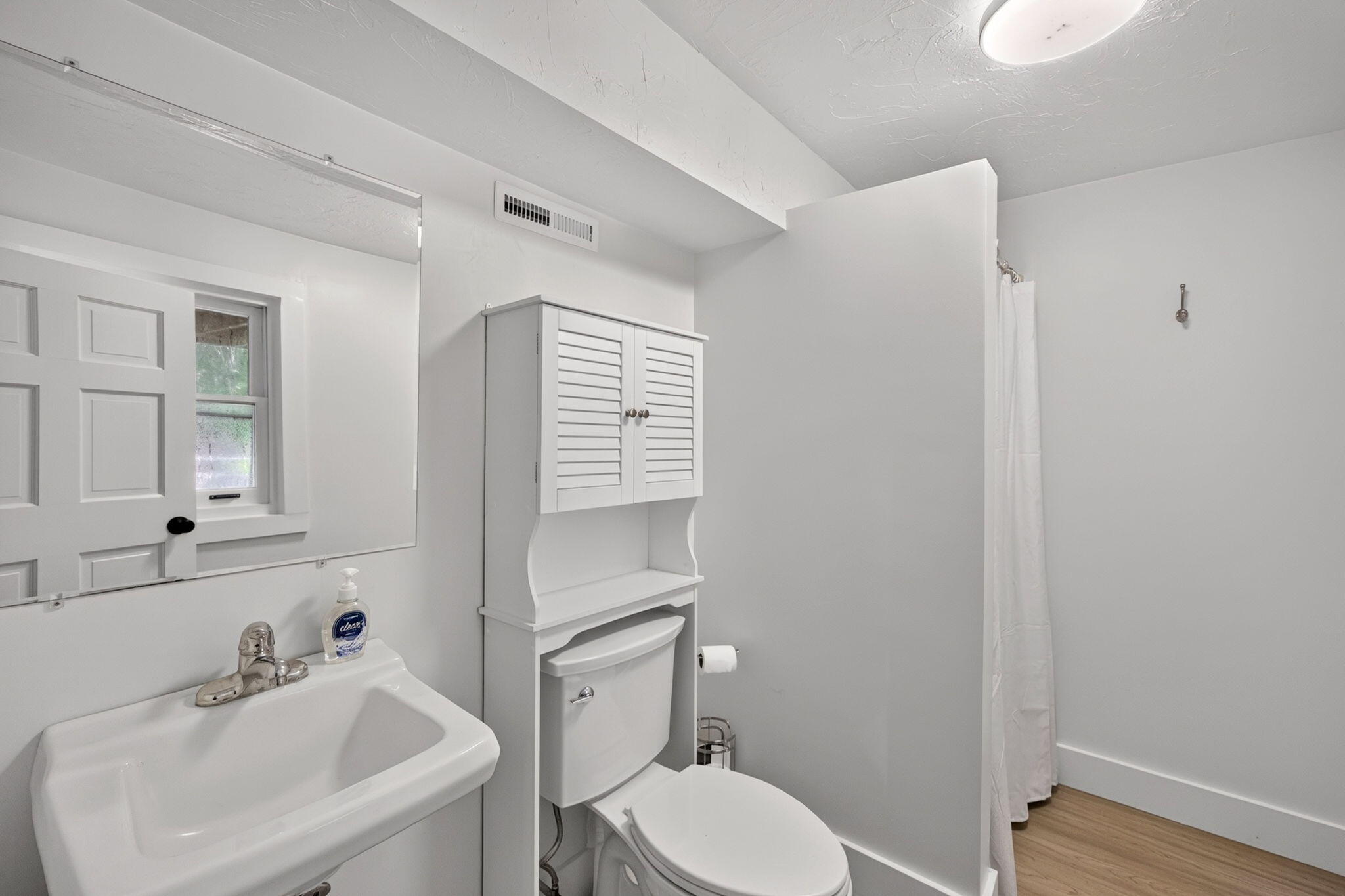 35 Debs Hill Road, Unit 35 Yarmouth Port, MA 02675 - Photo 22 of 36 a bathroom with a toilet sink and mirror