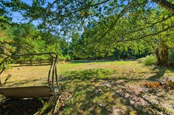 a view of a yard with an outdoor space