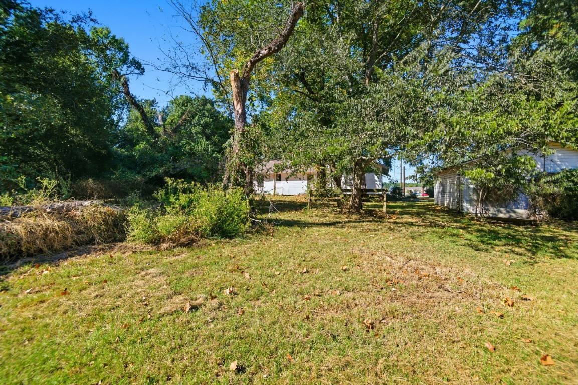 1200 Foster Drive Conroe, TX 77301 - Photo 16 of 18 a view of yard with green space