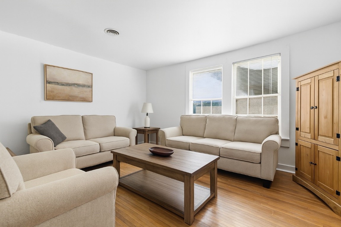 1200 Foster Drive Conroe, TX 77301 - Photo 3 of 18 a living room with furniture and a window