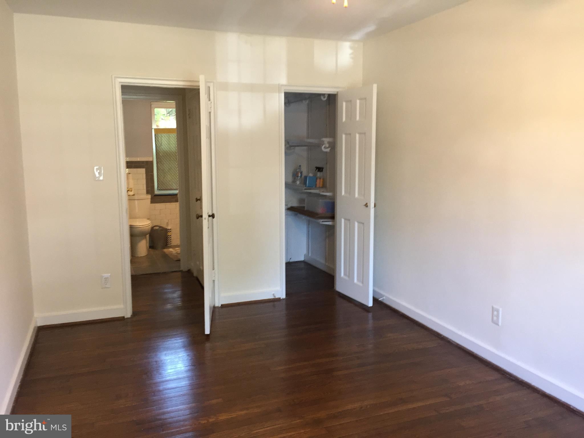 111 East Glebe Road, Unit D Alexandria, VA 22305 - Photo 10 of 14 a view of a hallway with wooden floor