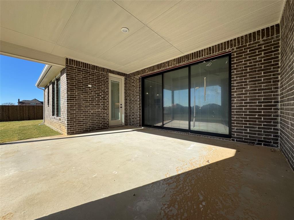 137 Red Fox Trail Godley, TX 76044 - Photo 18 of 18 a view of an empty room with a balcony