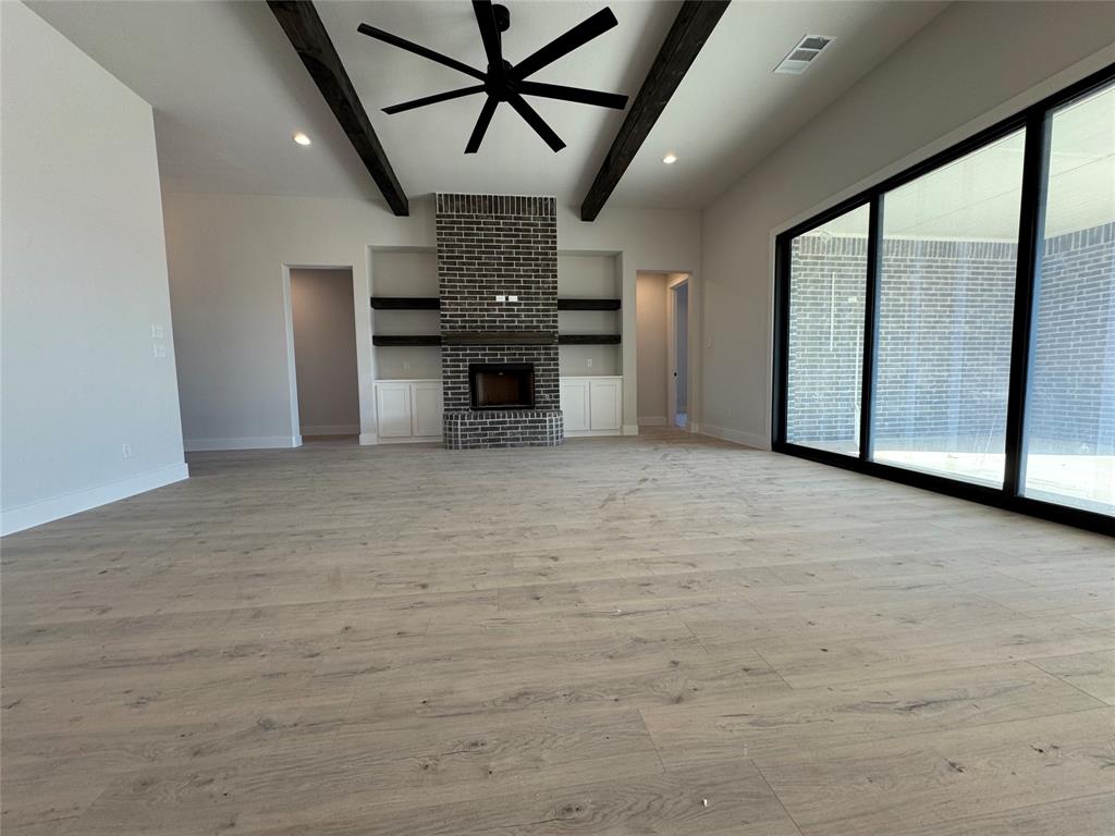 137 Red Fox Trail Godley, TX 76044 - Photo 5 of 18 a view of an empty room with a window