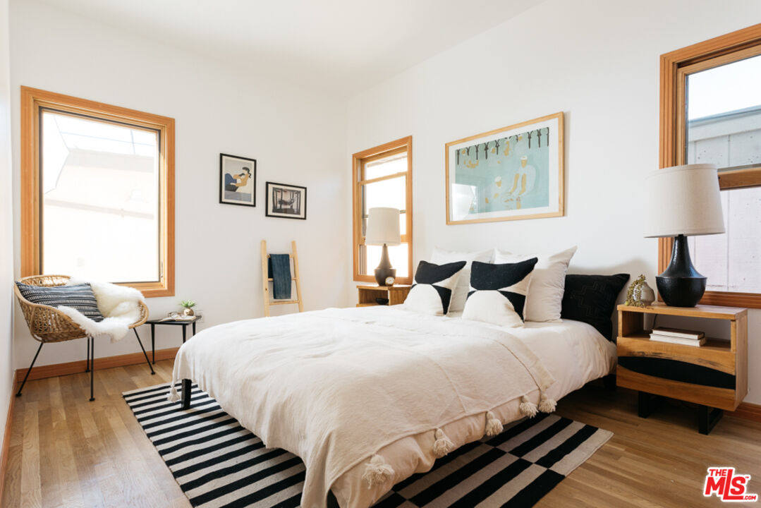 3009 Virginia Road Los Angeles, CA 90016 - Photo 12 of 17 a bedroom with bed and a window