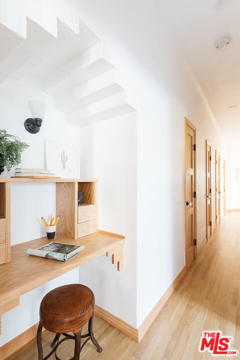 3009 Virginia Road Los Angeles, CA 90016 - Photo 7 of 17 a living room with dining table and wooden floor