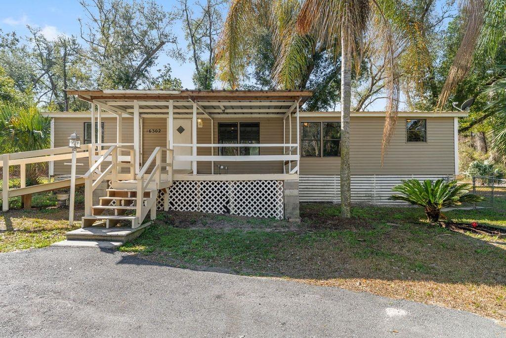 16302 Southeast 57th Street Ocklawaha, FL 32179 - Photo 1 of 64