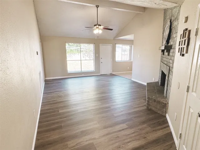 a view of livingroom with hardwood floor and window