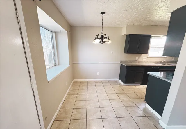 a view of an empty room with a sink