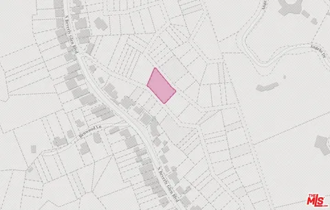 a white bath tub sitting next to a white wall