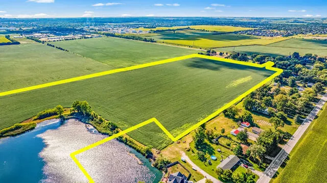 a view of a lake with a yard