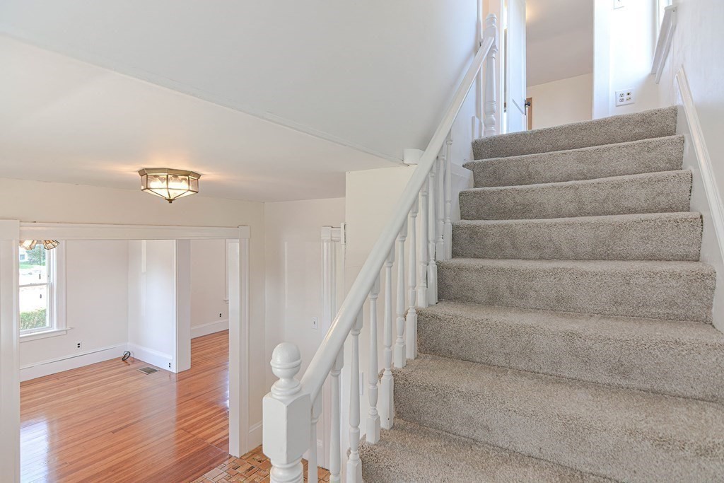12 Ballard Street Saugus, MA 01906 - Photo 16 of 38 a view of entryway and hall with wooden floor