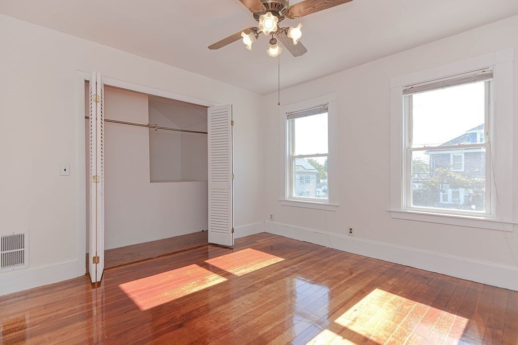 12 Ballard Street Saugus, MA 01906 - Photo 20 of 38 a view of a room with wooden floor and windows