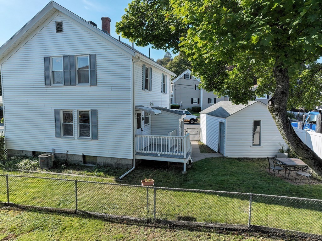 12 Ballard Street Saugus, MA 01906 - Photo 2 of 38 a view of a house with a yard