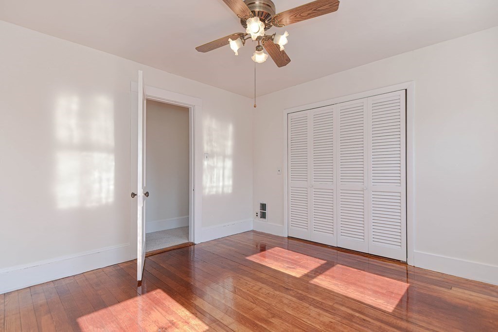 12 Ballard Street Saugus, MA 01906 - Photo 22 of 38 a view of empty room with wooden floor