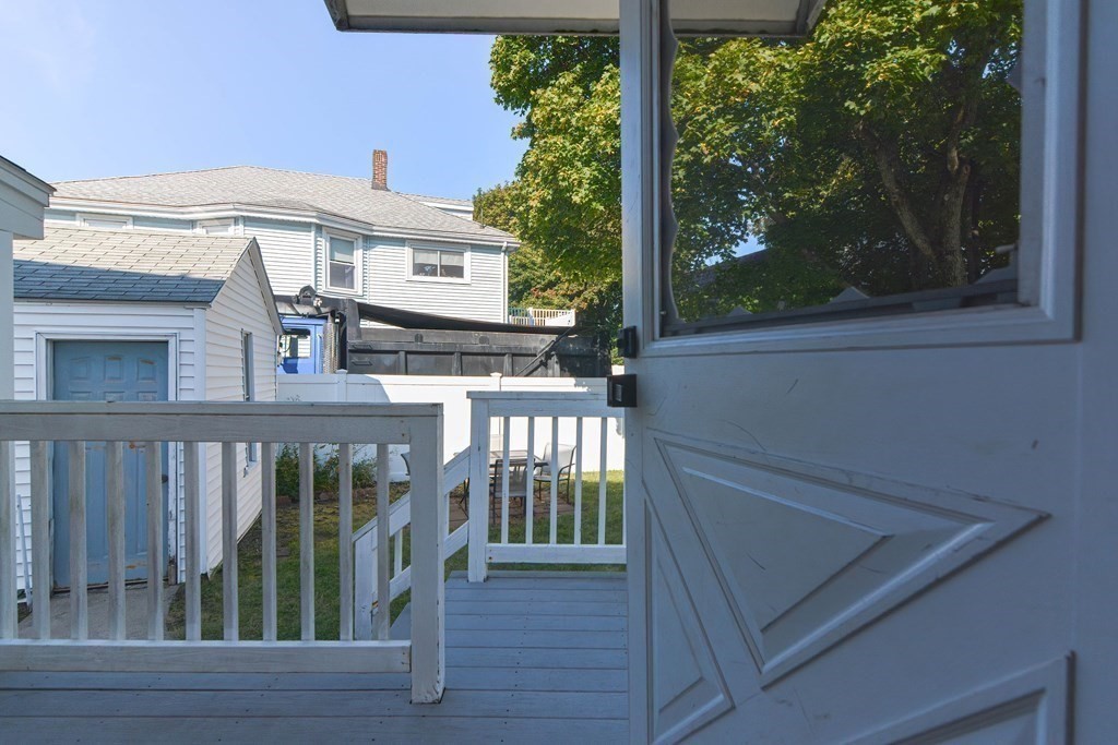12 Ballard Street Saugus, MA 01906 - Photo 32 of 38 a view of a balcony with furniture