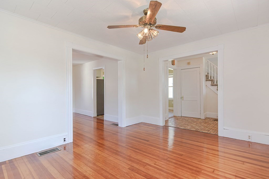 12 Ballard Street Saugus, MA 01906 - Photo 9 of 38 a view of an empty room with wooden floor