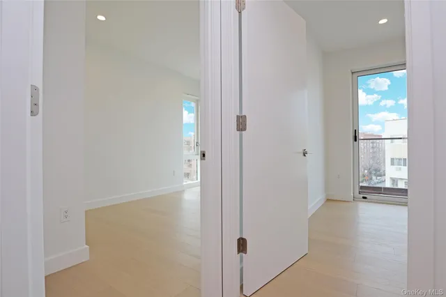 a bathroom with a sink toilet a mirror and bathtub