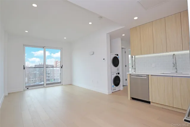 an empty room with entrance door