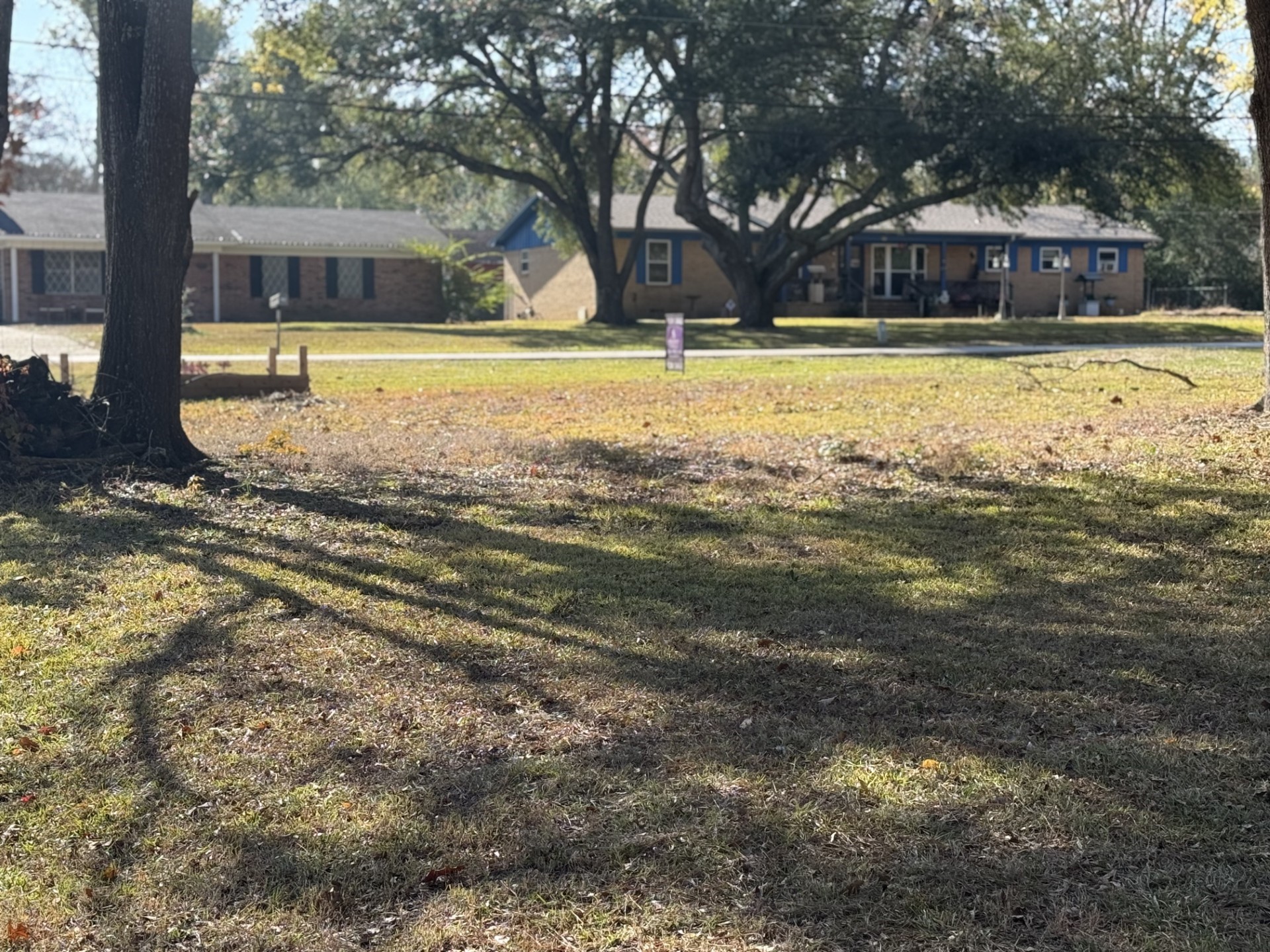 219 Perryman Road Lindale, TX 75771 - Photo 5 of 6 a view of a house with a yard