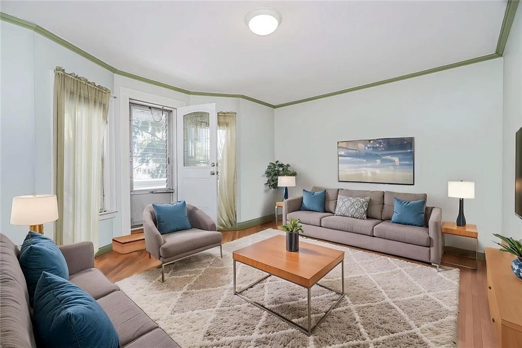 222 Albemarle Road Brooklyn, NY 11218 - Photo 28 of 41 a living room with furniture and a large window