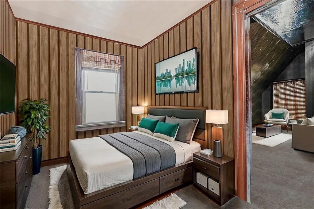 222 Albemarle Road Brooklyn, NY 11218 - Photo 34 of 41 a bedroom with a bed and a potted plant