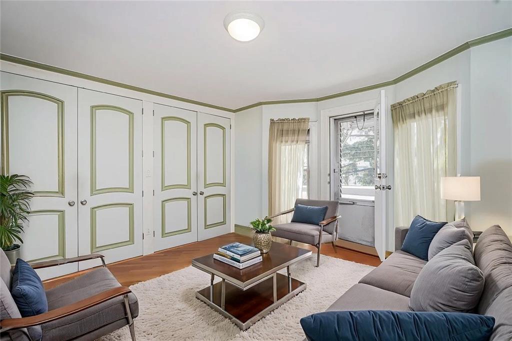 222 Albemarle Road Brooklyn, NY 11218 - Photo 35 of 41 a living room with furniture and a window