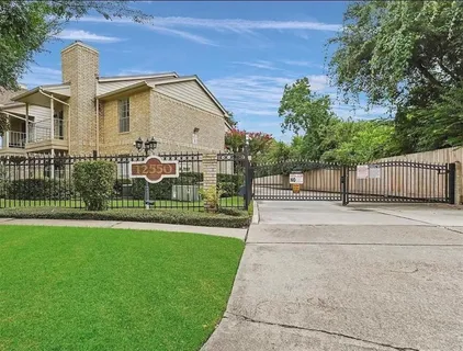 a view of a house with swimming pool