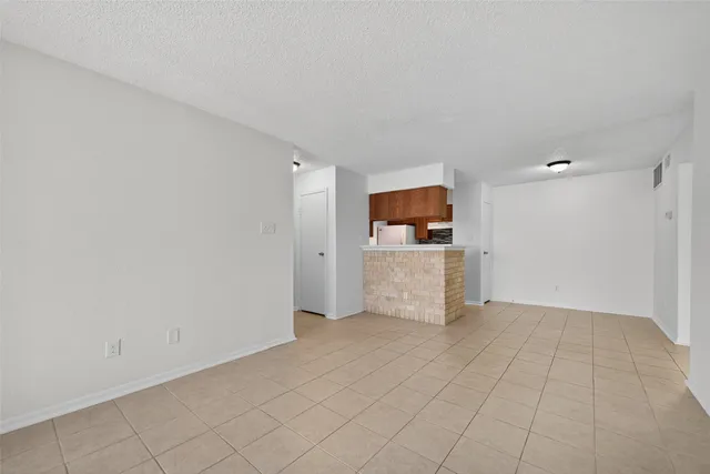 a view of a kitchen with a sink