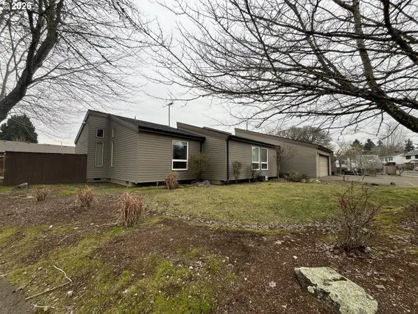 a house view with a backyard space