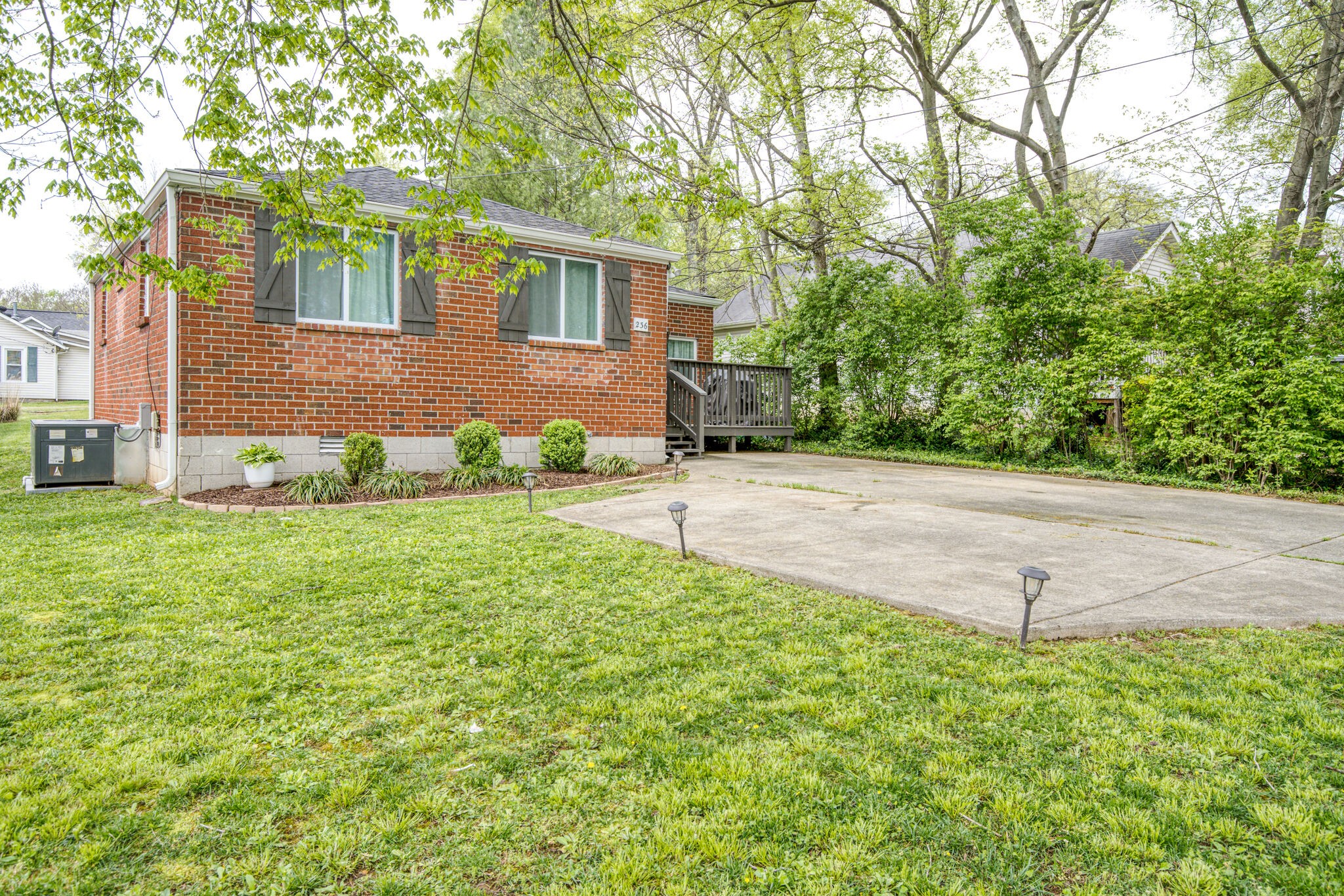 236 Forest Park Road Madison, TN 37115 - Photo 1 of 23 a backyard of a house with lots of green space