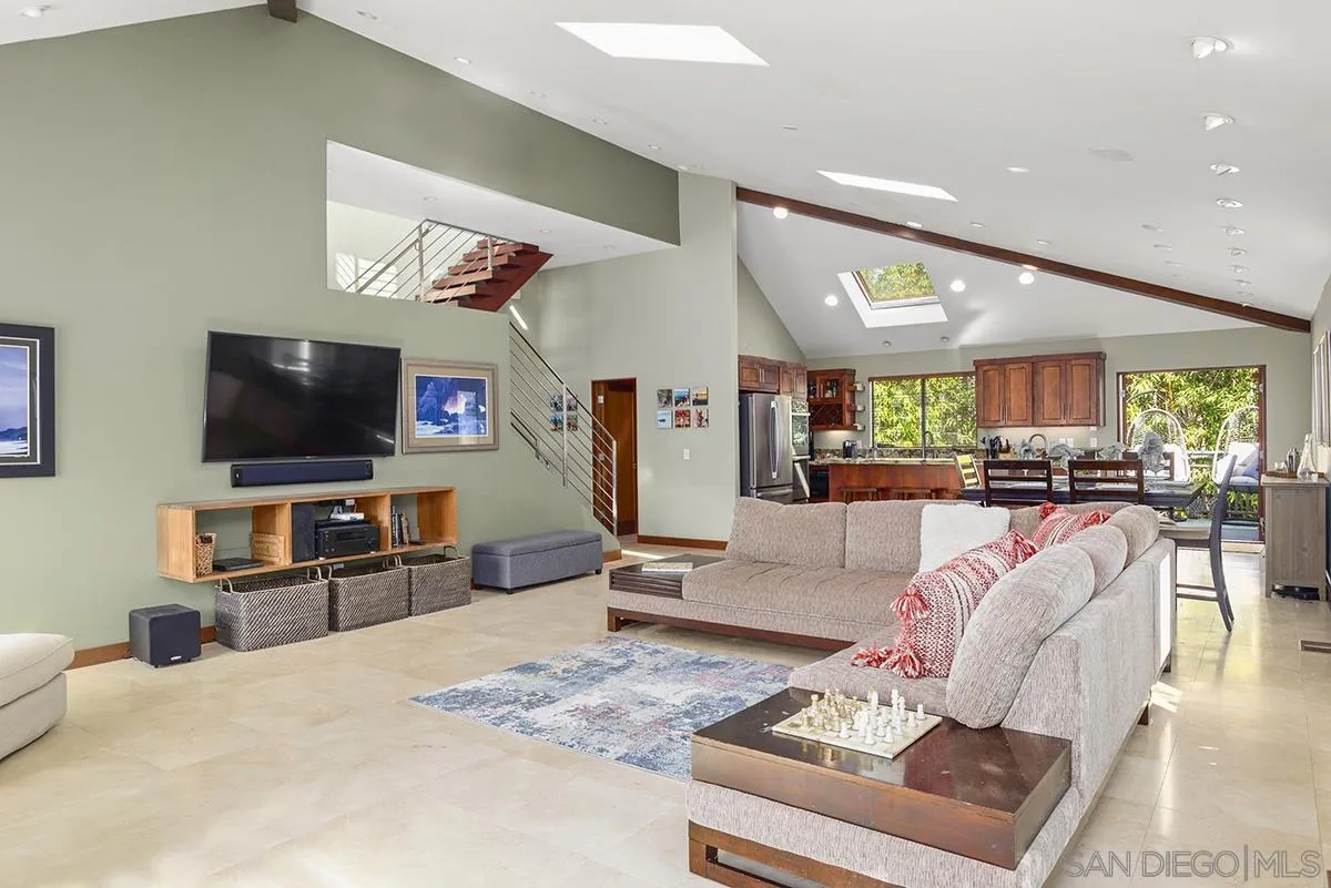 13613 Mar Scenic Drive Del Mar, CA 92014 - Photo 11 of 46 a living room with furniture and a flat screen tv