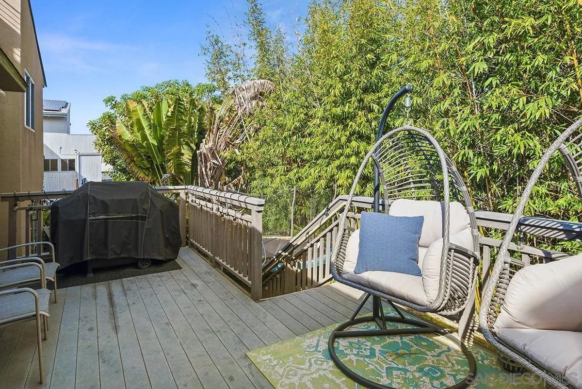 13613 Mar Scenic Drive Del Mar, CA 92014 - Photo 19 of 46 a balcony with table and chairs