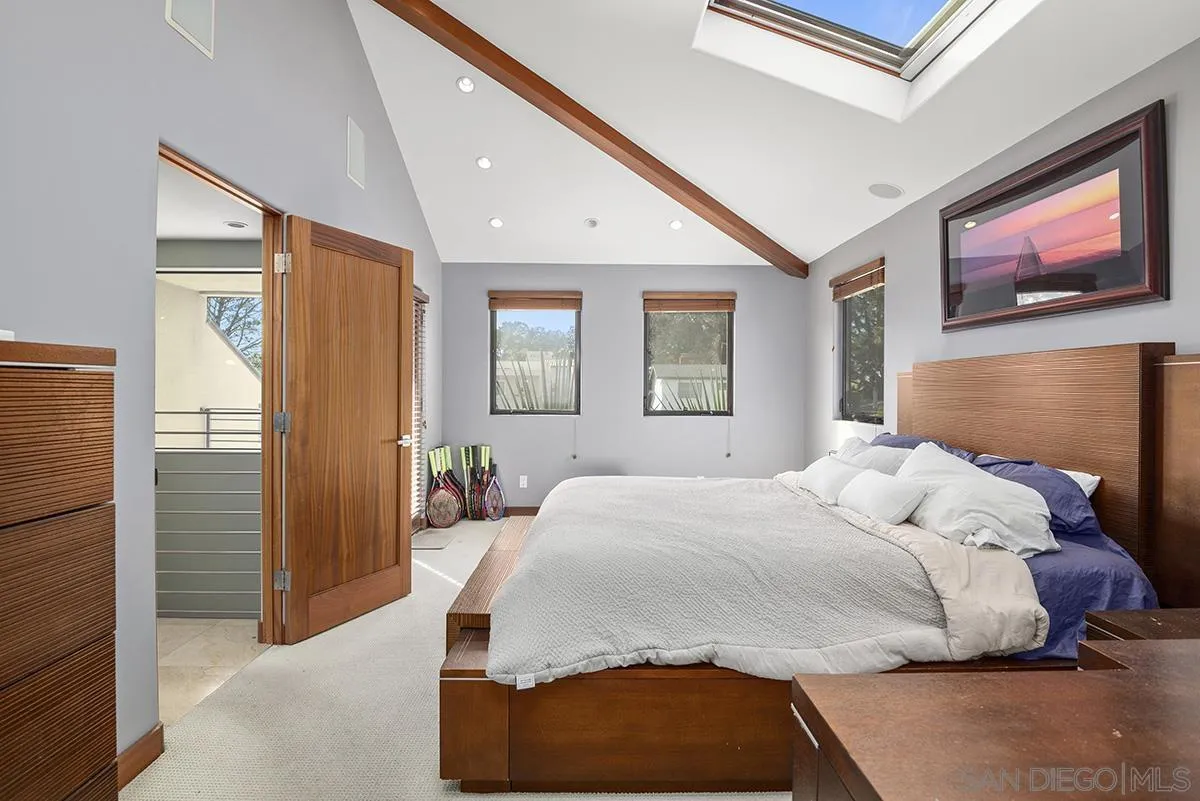 13613 Mar Scenic Drive Del Mar, CA 92014 - Photo 24 of 46 a bedroom with a large bed and a window