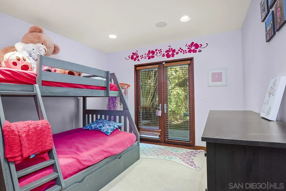 13613 Mar Scenic Drive Del Mar, CA 92014 - Photo 31 of 46 a bedroom with a bed and a window