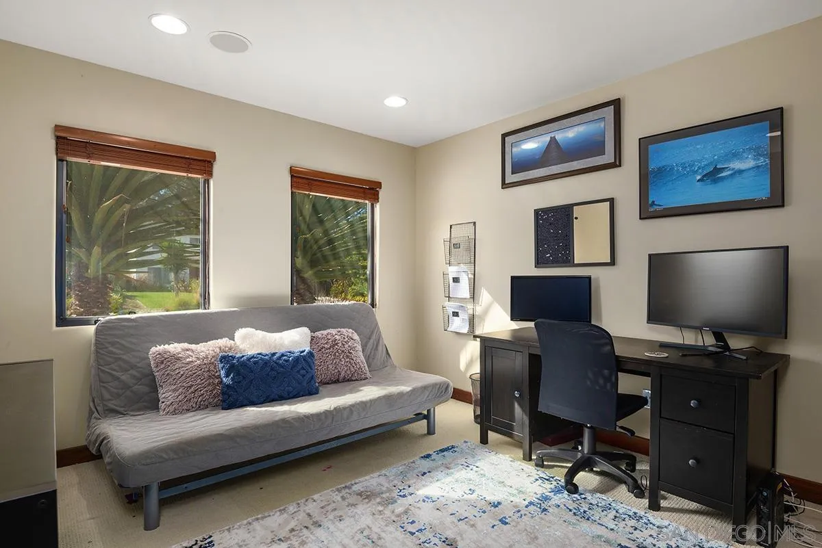 13613 Mar Scenic Drive Del Mar, CA 92014 - Photo 33 of 46 a livingroom with workspace couch and a window