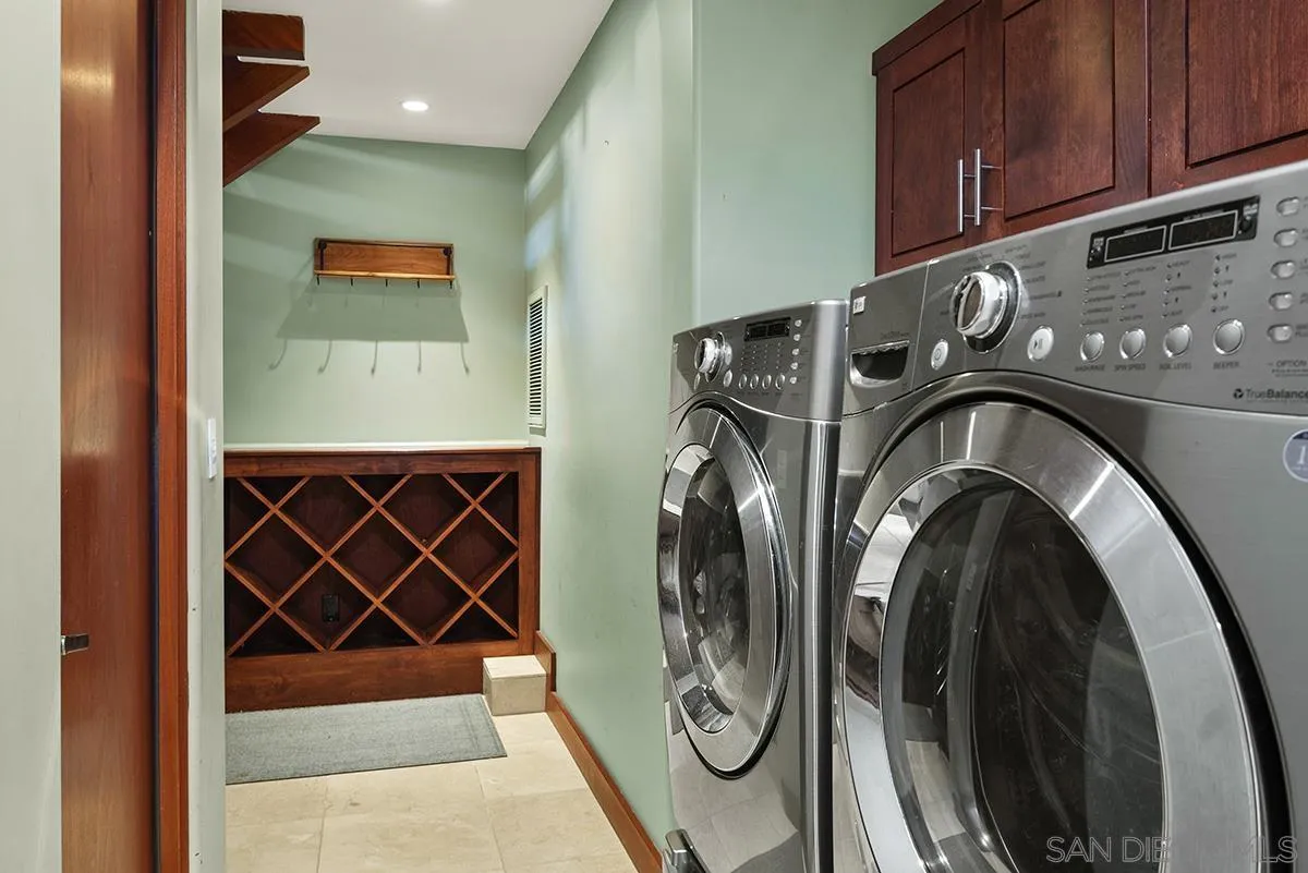13613 Mar Scenic Drive Del Mar, CA 92014 - Photo 42 of 46 a utility room with dryer and washer