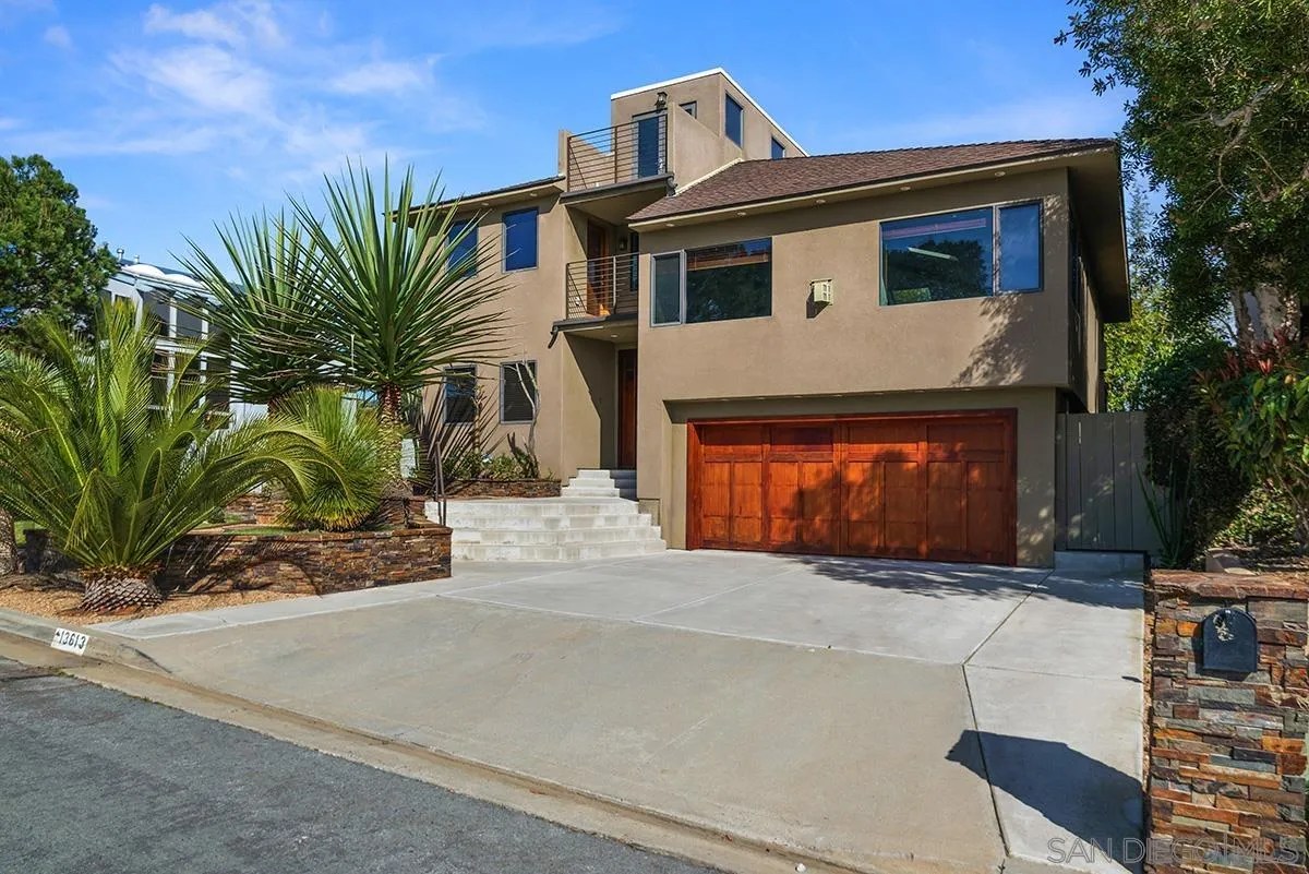 13613 Mar Scenic Drive Del Mar, CA 92014 - Photo 43 of 46 a front view of a house with a yard