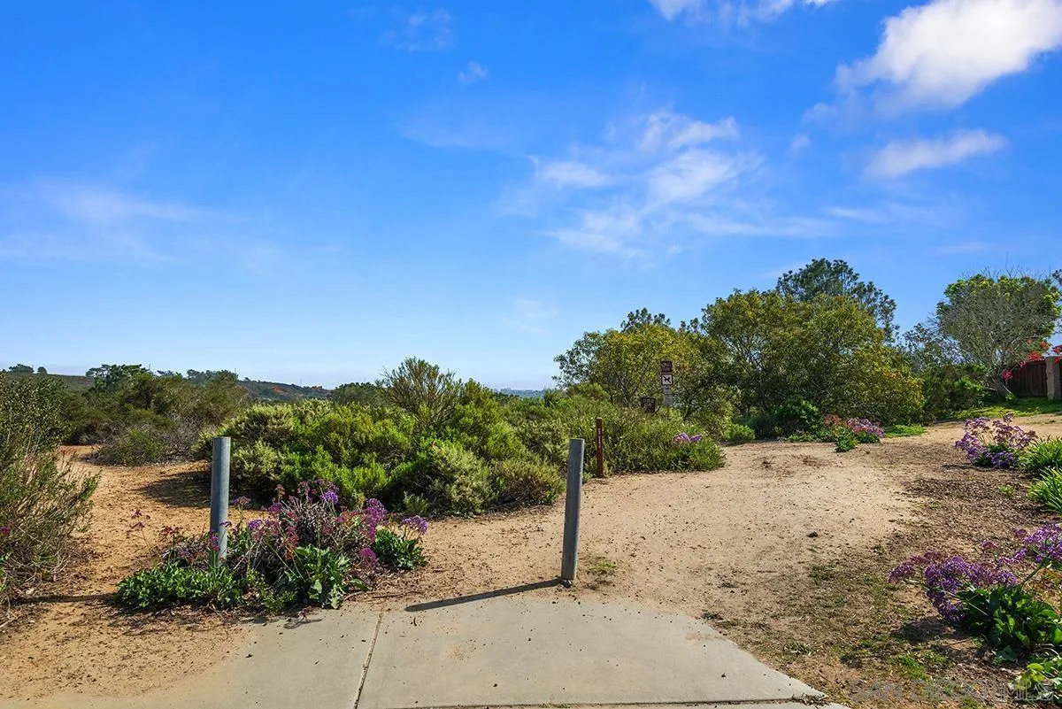 13613 Mar Scenic Drive Del Mar, CA 92014 - Photo 44 of 46 a view of a road with a building in the background
