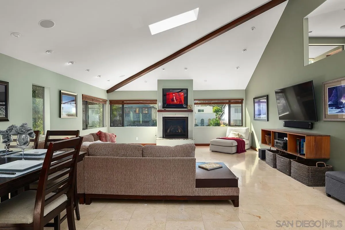 13613 Mar Scenic Drive Del Mar, CA 92014 - Photo 6 of 46 a living room with fireplace furniture and a flat screen tv